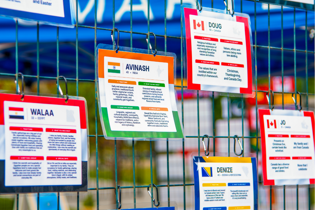 Residents reading the CultureFest display board